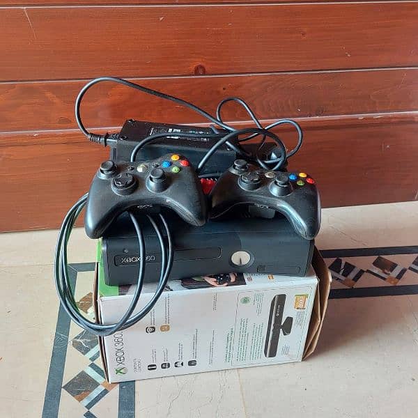 xbox 360 with two controls 2