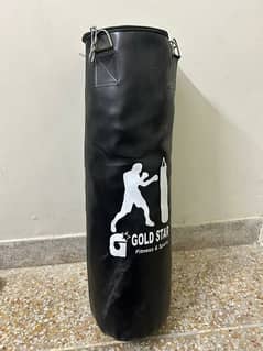 boxing bag with filling and gloves