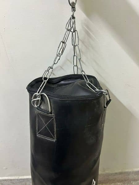 boxing bag with filling and gloves 1