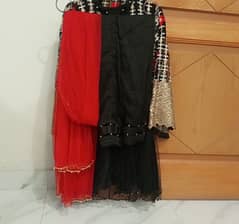 "Net embroided frock with Silk lining,silk trouser and net dupatta"