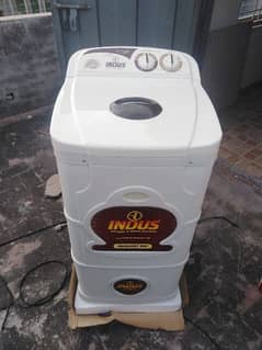 Indus washing machine and drier