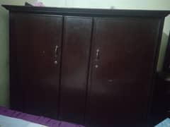 heavy wooden cupboard