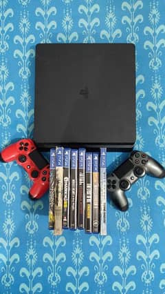 PS4 Slim 1 Tb - With 2 controllers and 8 games 0