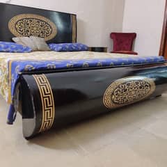 Bed with two side tables