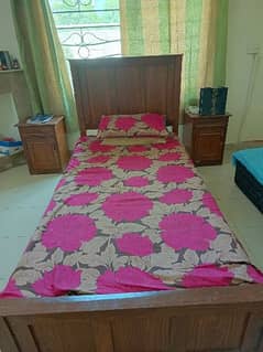 2 single beds without mattress with 2 side tables