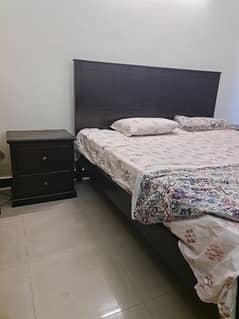 1 Double Bed (with 2 side tables and spring mattress)