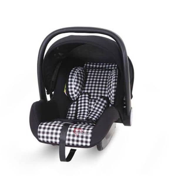 Tinnies car seat/carry cot 1