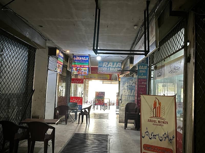 Urgent Commercial Shop For Sale On Ground Floor Opposite Emporium Mall And Excpo Center 2