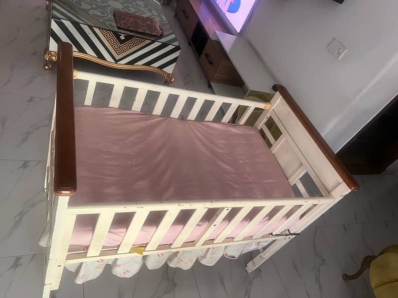 white wooden baby cot 3