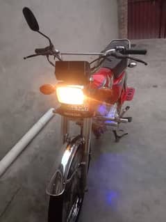 Honda 125 bike 2017 model red color