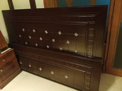 slightly used wooden bed call 0312'4049'200