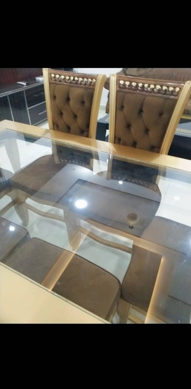 Glass top Dining table with 6 chairs 1