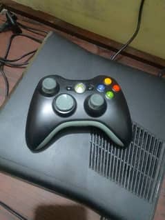 Xbox 360 with original box and controller with charging battery pack