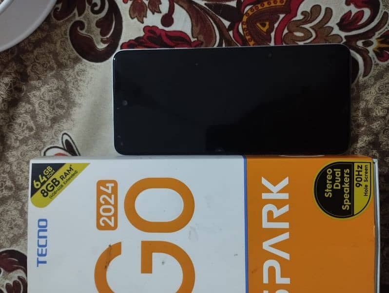 Tecno spark go 2024 model with charger 2