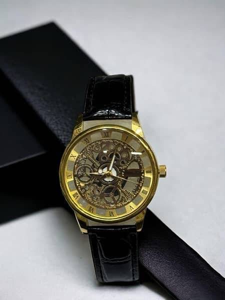 Skelton dial watch for men in leather strap 1