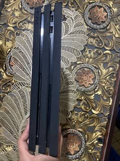 ps4 pro 1tb with two controllers and 7 games