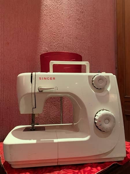 singer machine almost new all things working great phone 0324-8384580 1