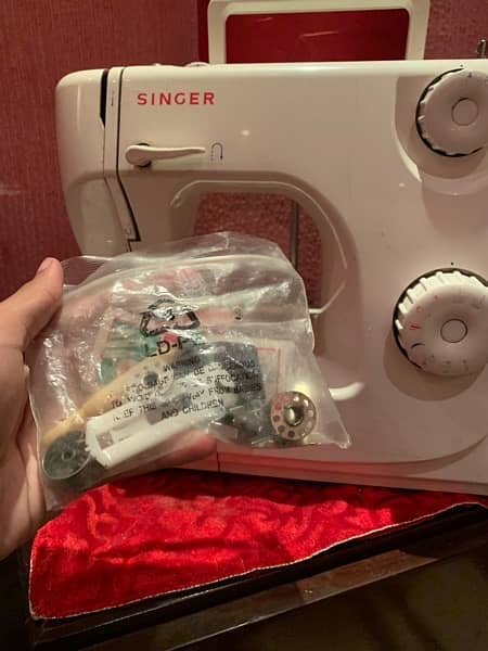 singer machine almost new all things working great phone 0324-8384580 4