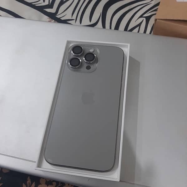 I phone 15 Pro Max natural titanium in full warrenty 3