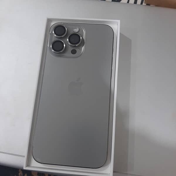 I phone 15 Pro Max natural titanium in full warrenty 6