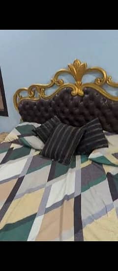 king size bed with foam mattress and side table