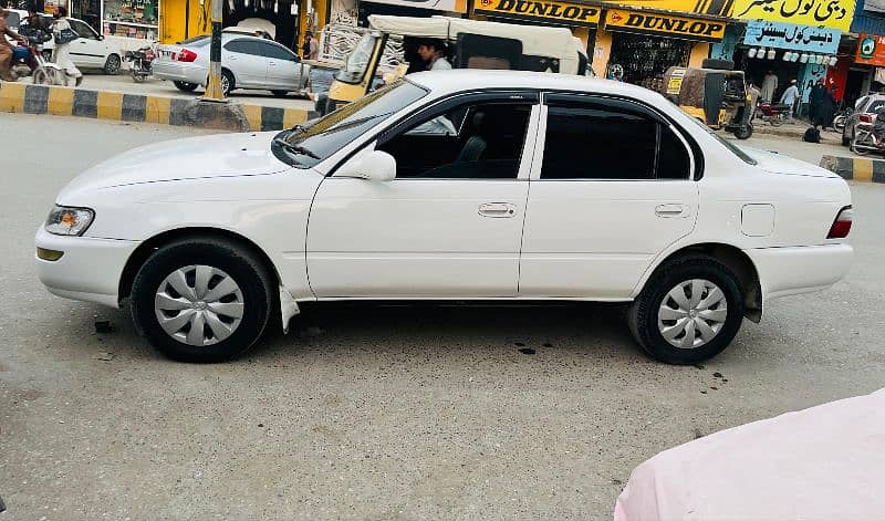 Toyota Corolla induss 1998 model fully showred rangers auction sindh n 0