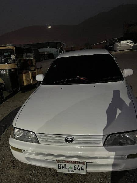 Toyota Corolla induss 1998 model fully showred rangers auction sindh n 2