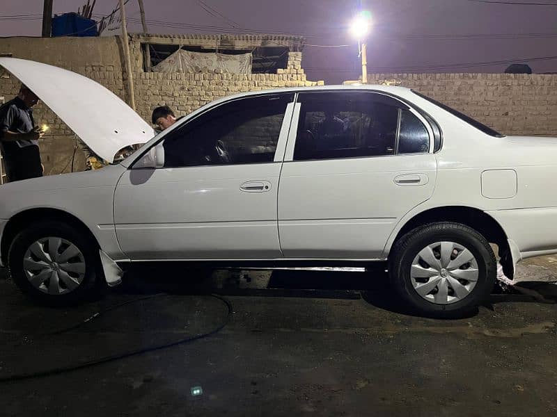 Toyota Corolla induss 1998 model fully showred rangers auction sindh n 5