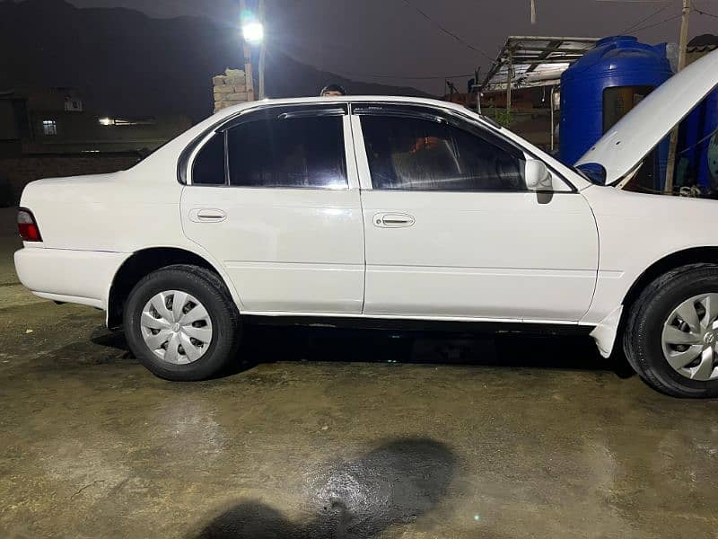 Toyota Corolla induss 1998 model fully showred rangers auction sindh n 12