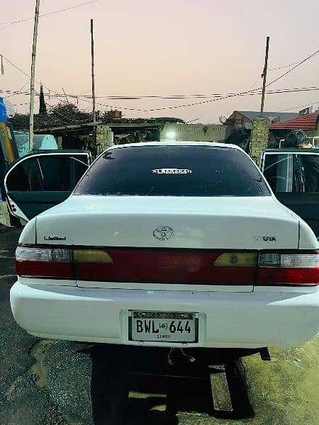 Toyota Corolla induss 1998 model fully showred rangers auction sindh n 13