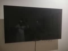 TCL 65 INCH ALMOST NEW