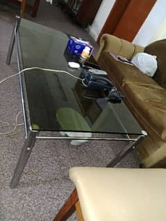 imported glass table with 2 small tables in good condition