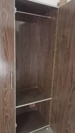 Wooden Wardrobe and Iron Stand Not Used Available