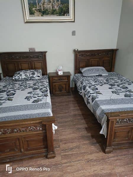 two single hand made beds with two sidetables  and metresswith metress 0