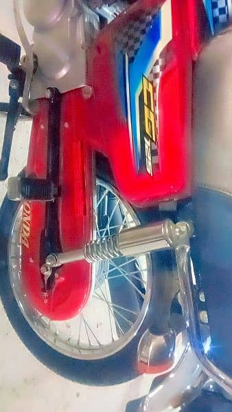 red color Honda 125cc 4