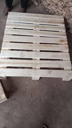 plastic and wooden pallets