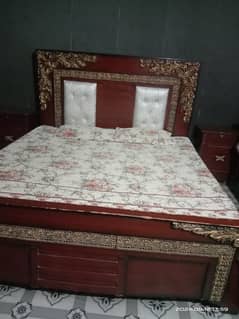 bed and dressing side table