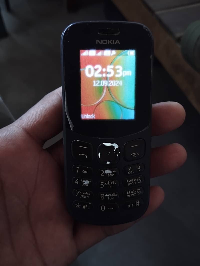 Nokia original 130 mad in Vietnam charger daba saath 2