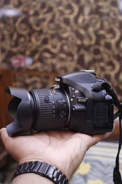 Nikon d5200 with 18/55mm Vr dx lens 10/10+++