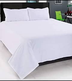 white bedsheets and towel