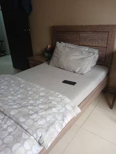 Single bed with side table, cupboard and matress