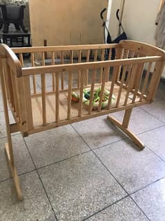 wooden baby cot and swing