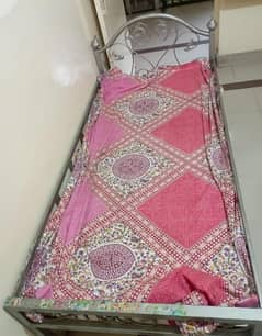 single iron bed