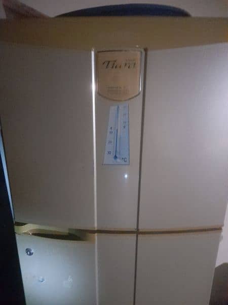 A fridge Mitsubishi made in Japan ۔ 2