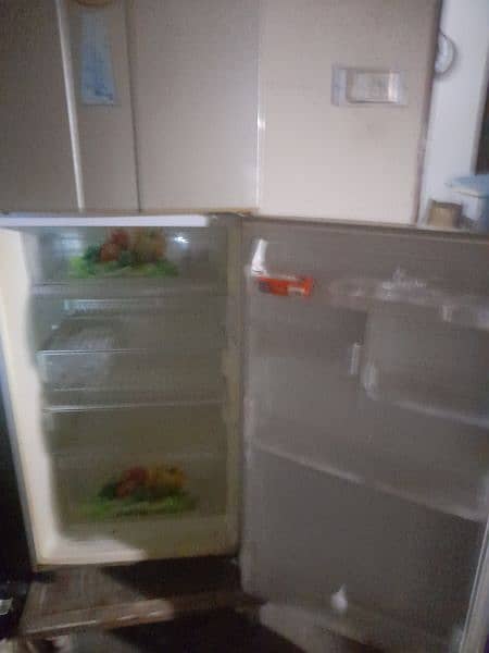 A fridge Mitsubishi made in Japan ۔ 9