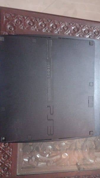 PS 3 Slim with 2 Controllers 1