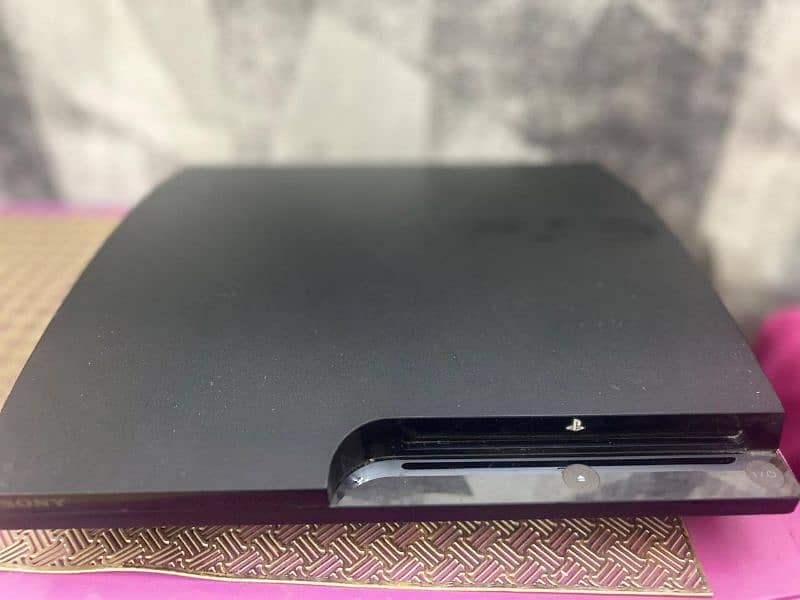 PS 3 Slim with 2 Controllers 2