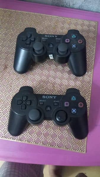 PS 3 Slim with 2 Controllers 5