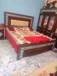 king size bed with dressing table and almirah