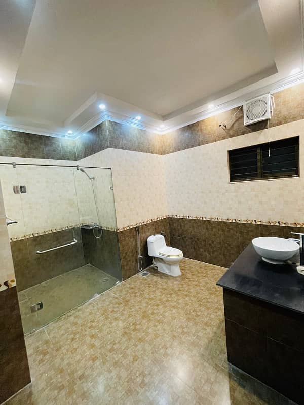 1 Kanal straight modern design house for rent near sport complex genuine add 31